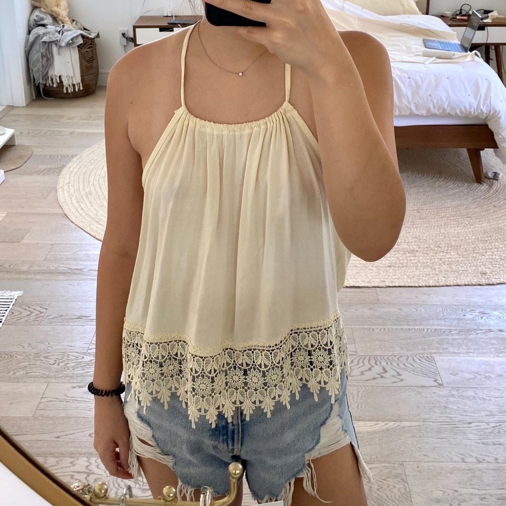 Cream halter top with lace hem